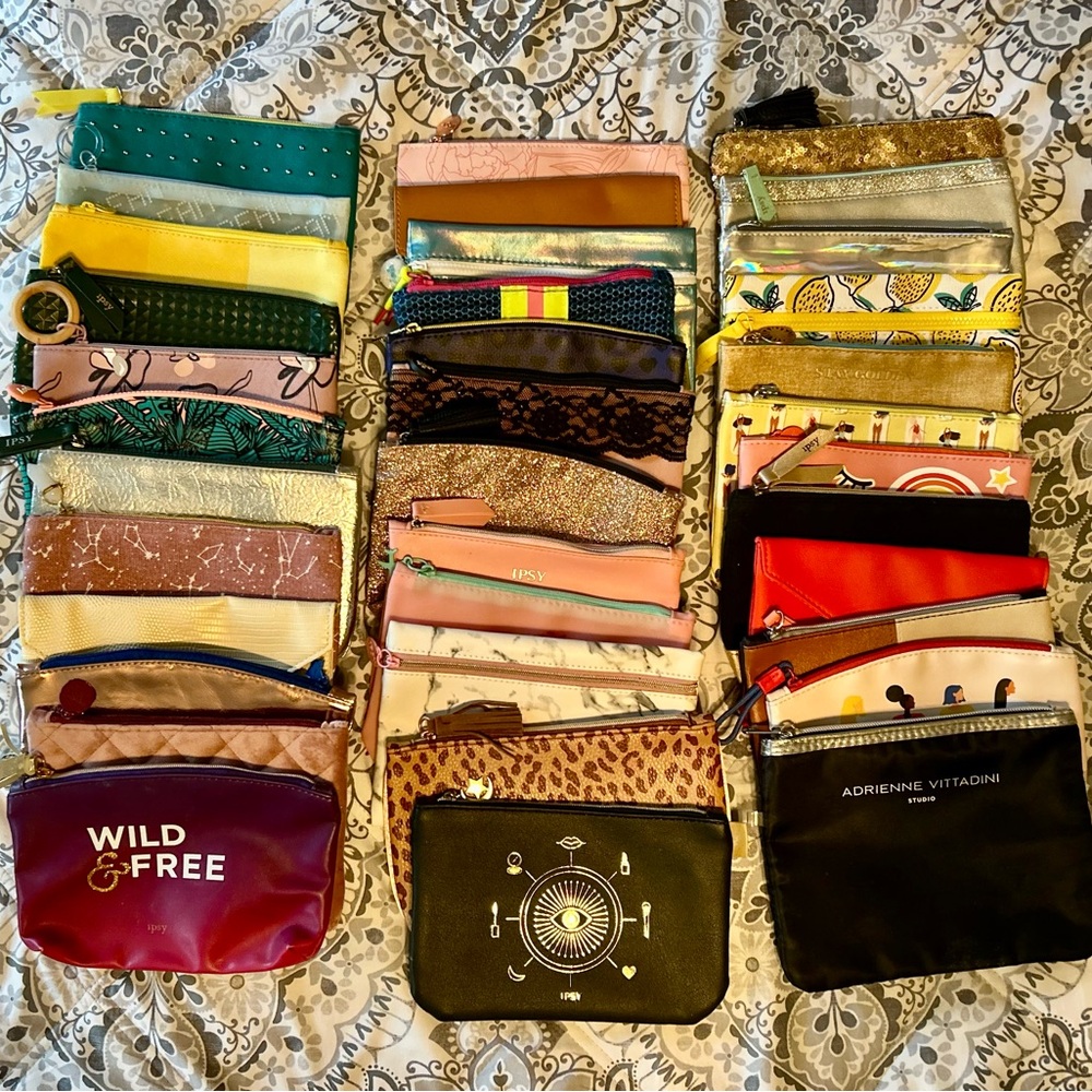 36 Ipsy Cosmetic Bags Collection - Multicolor. Never used.